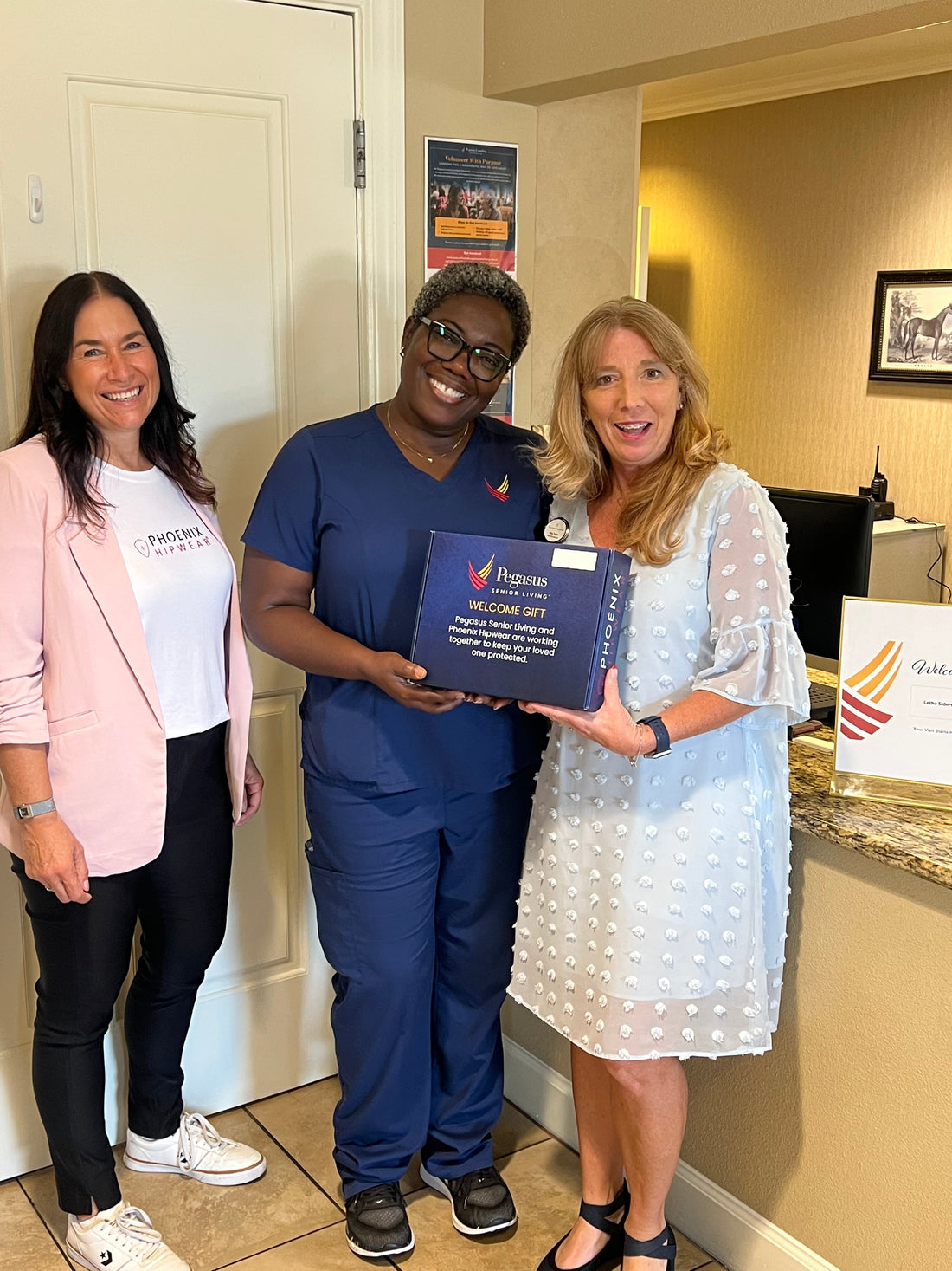 Pegasus Senior Living staff and Phoenix Hipwear founder Natasha Williams celebrating the hip protection safety program